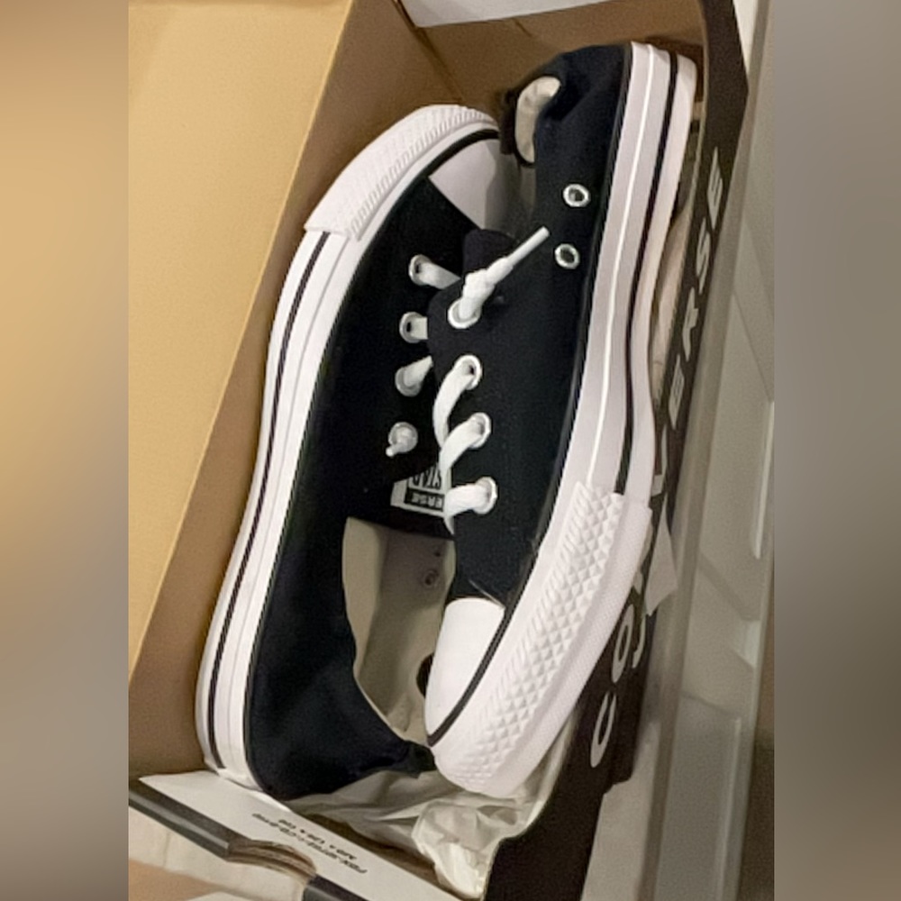 Brand new black converse slip on sneakers. NWT.